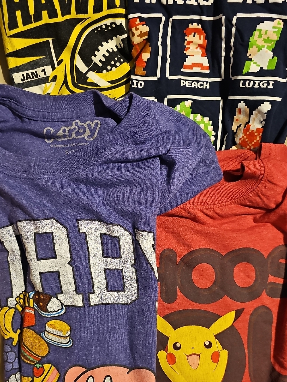 Lot of 4 Men's Small Graphic Tees.